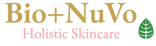 A pink and gold logo for skin care products.